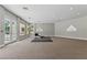 Spacious gym featuring a large window and neutral walls that provide an elegant look at 13 Dovetail Cir, Henderson, NV 89014