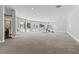 Spacious gym featuring a large window with carpet flooring providing an elegant look at 13 Dovetail Cir, Henderson, NV 89014