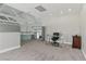 Second floor office space with gray carpeting, a glass desk, and recessed lighting at 13 Dovetail Cir, Henderson, NV 89014