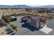 Aerial view of the home, showing the pool, outbuildings, lot, and exterior at 1361 Moose St, Pahrump, NV 89048