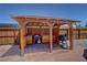 This barbecue area includes a built-in grill and workspace in a covered structure at 1361 Moose St, Pahrump, NV 89048
