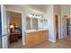 Bright bathroom with vanity and walk-in closet offering generous storage at 1361 Moose St, Pahrump, NV 89048