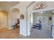 Bright exercise room showcases a framed opening and view to the rest of the home at 1361 Moose St, Pahrump, NV 89048