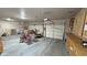 Spacious garage with multiple garage doors, storage, and ample work area at 1361 Moose St, Pahrump, NV 89048