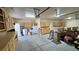 Large garage featuring lots of storage cabinets, water heater and convenient access door at 1361 Moose St, Pahrump, NV 89048