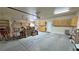 Spacious garage area with built-in cabinets and ample room for storage and workbench at 1361 Moose St, Pahrump, NV 89048