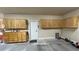 Practical garage area with built-in cabinets, a workbench, and ample storage at 1361 Moose St, Pahrump, NV 89048