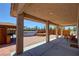 Enjoy outdoor living on this covered patio with an above ground pool and built-in barbecue area at 1361 Moose St, Pahrump, NV 89048
