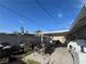 Backyard featuring an outdoor cooking area and covered patio perfect for entertaining at 1429 S Sandhill Rd, Las Vegas, NV 89104