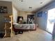A home's laundry room featuring a sofa and washer and dryer at 1429 S Sandhill Rd, Las Vegas, NV 89104