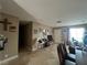 Open concept living room with tile floors and a view of the front door at 1429 S Sandhill Rd, Las Vegas, NV 89104