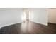 Bedroom features wood-look floors and base trim providing a clean, modern aesthetic at 1601 Iguana St, Pahrump, NV 89048