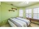 Bedroom featuring a bed, a desk, shelves and natural light at 169 Alterra Dr, Henderson, NV 89074
