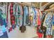 Organized closet with hanging clothes and shelf storage at 169 Alterra Dr, Henderson, NV 89074