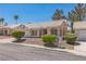 Charming single-story home with well-maintained landscaping and a private two-car garage at 169 Alterra Dr, Henderson, NV 89074