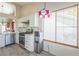 Kitchen featuring stainless steel appliances, light wood floors, and ample natural light at 169 Alterra Dr, Henderson, NV 89074