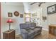 Cozy living room features wood-look floors and a comfortable seating area at 169 Alterra Dr, Henderson, NV 89074