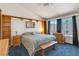Charming main bedroom with built-in shelving, backyard views, and neutral decor at 169 Alterra Dr, Henderson, NV 89074