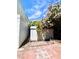 Outdoor backyard area features a storage shed and blossoming trees at 1748 Jupiter Ct # C, Las Vegas, NV 89119