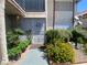 Charming condo with a quaint front entrance, beautiful flowers and a secure gated entry at 1748 Jupiter Ct # C, Las Vegas, NV 89119
