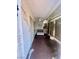 Extended patio with a ceiling fan and lounge area is enhanced by natural light at 1748 Jupiter Ct # C, Las Vegas, NV 89119