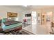 This main bedroom with a TV, seating and view to other parts of the house at 1809 Prichard Ave, Henderson, NV 89052