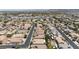 This aerial view captures the home in a suburban community with well-maintained streets and desert landscaping at 2025 Dakota Lodge Ave, Las Vegas, NV 89123