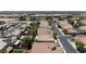 Residential aerial view showcasing neighborhood with solar panels on roofs, street layout at 2025 Dakota Lodge Ave, Las Vegas, NV 89123