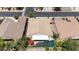 Aerial view of property showcasing backyard pool, patio, and proximity to neighbors at 2025 Dakota Lodge Ave, Las Vegas, NV 89123