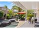 Inviting backyard pool with a covered patio, lush landscaping, and a relaxing spa at 2025 Dakota Lodge Ave, Las Vegas, NV 89123