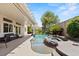 Beautiful backyard pool and spa with a covered patio, providing the perfect outdoor retreat at 2025 Dakota Lodge Ave, Las Vegas, NV 89123