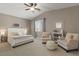 Comfortable bedroom with ample natural light, neutral colors, and cozy furnishings at 2025 Dakota Lodge Ave, Las Vegas, NV 89123