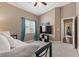 Bedroom with TV on the wall and large window that provides plenty of light at 2025 Dakota Lodge Ave, Las Vegas, NV 89123