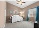 Bright and airy bedroom with a cozy bed, colorful decor, and ample natural light at 2025 Dakota Lodge Ave, Las Vegas, NV 89123