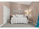 Cozy bedroom featuring a daybed with white bedding and closet with sliding doors at 2025 Dakota Lodge Ave, Las Vegas, NV 89123