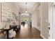 Welcoming entryway featuring hardwood floors and sight lines to living spaces beyond at 2025 Dakota Lodge Ave, Las Vegas, NV 89123