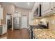 Modern kitchen with stainless steel appliances and granite countertops at 2025 Dakota Lodge Ave, Las Vegas, NV 89123