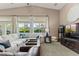 Inviting living room with comfortable seating, large windows, and neutral decor at 2025 Dakota Lodge Ave, Las Vegas, NV 89123