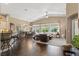 Bright, open-concept living room features wood floors and neutral decor at 2025 Dakota Lodge Ave, Las Vegas, NV 89123