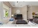 Comfortable living room with neutral tones and plush carpeting at 2025 Dakota Lodge Ave, Las Vegas, NV 89123