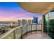 Spacious balcony with glass railings offering panoramic views of the city skyline at 222 Karen Ave # 3307, Las Vegas, NV 89109