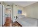 Modern bedroom with wood floors, neutral tones, and a comfortable bed, creating a peaceful retreat at 222 Karen Ave # 3307, Las Vegas, NV 89109