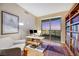 Bright home office featuring a modern desk, comfortable seating, and expansive windows with city views at 222 Karen Ave # 3307, Las Vegas, NV 89109