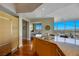 Open kitchen with granite countertops and stainless appliances adjoins living area with stunning city views at 222 Karen Ave # 3307, Las Vegas, NV 89109