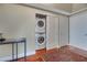 Convenient laundry area featuring a stacked washer and dryer, and ample storage space at 222 Karen Ave # 3307, Las Vegas, NV 89109
