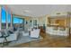 Elegant living room with stylish furnishings, floor-to-ceiling windows, and an open concept kitchen at 222 Karen Ave # 3307, Las Vegas, NV 89109