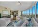 Sunlit living room with modern furnishings, floor-to-ceiling windows, and city views at 222 Karen Ave # 3307, Las Vegas, NV 89109