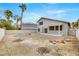A spacious backyard with a covered patio, offering ample space for landscaping and outdoor activities at 2418 Antler Point Dr, Henderson, NV 89074