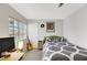 This bedroom features a window and a guitar near the door at 2418 Antler Point Dr, Henderson, NV 89074