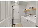 Convenient laundry room with modern washer and dryer at 2418 Antler Point Dr, Henderson, NV 89074